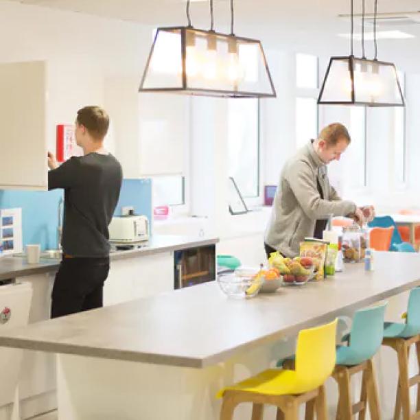 People using the office kitchen