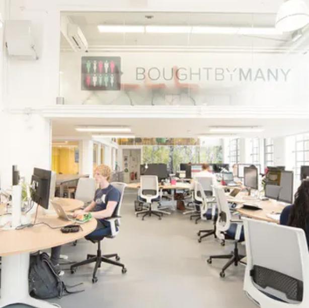 The Boughtbymany open office space
